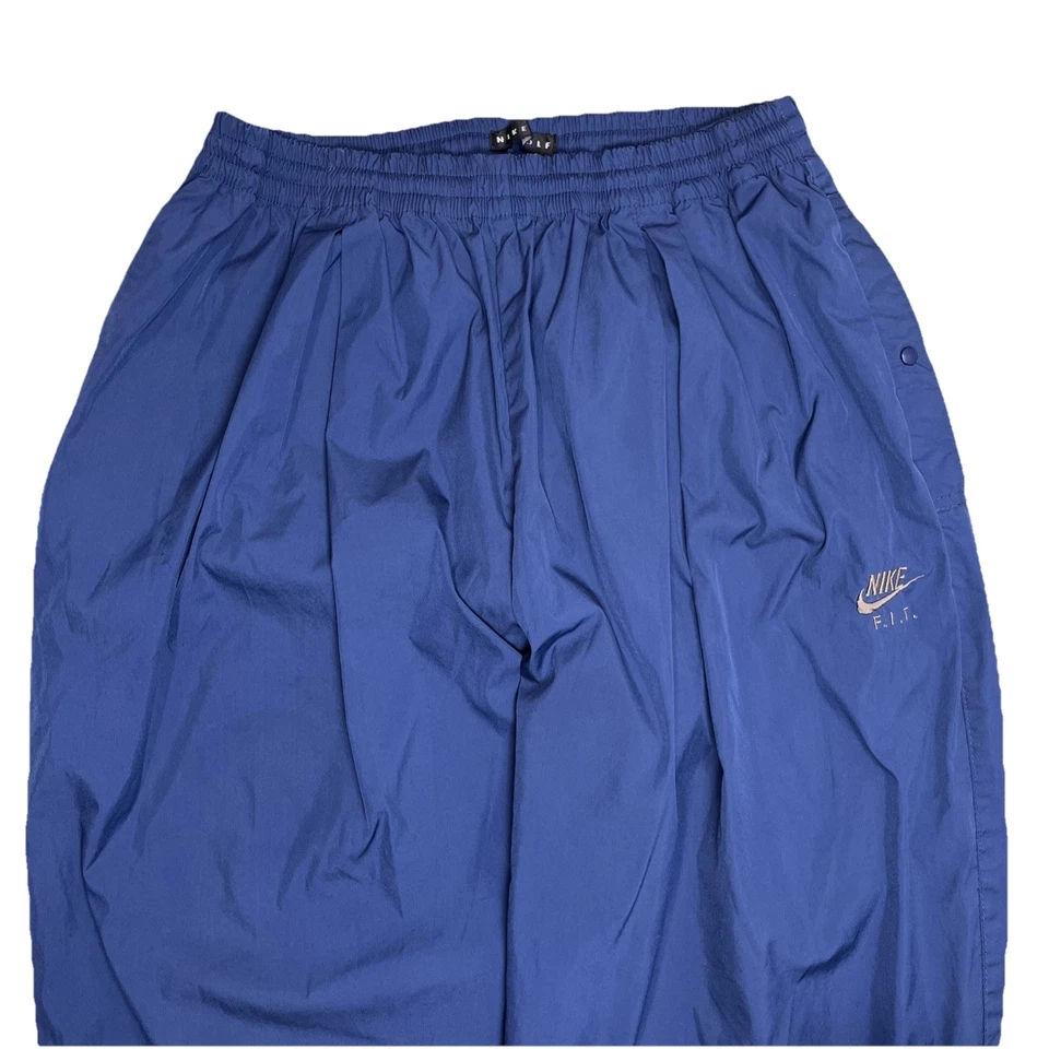 Pantalones de lluvia vintage Nike Golf Y2K para hombre cortavientos cremallera tobillo pista azul marino XL Foto 3 de 4