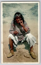 Native American Moki Indian Man Sitting and Smoking a Cigarette Postcard 1924