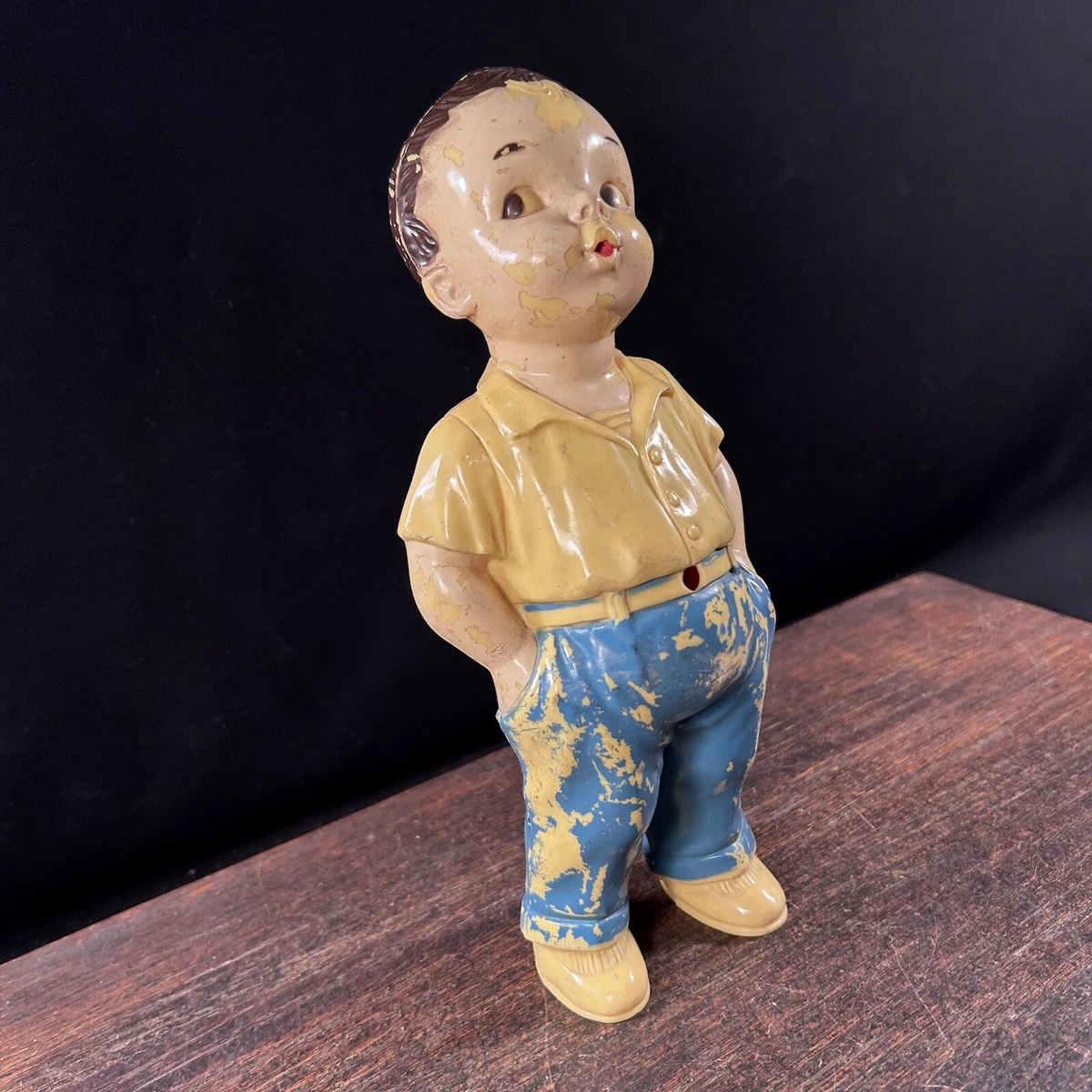 Whistling on sale boy figurine
