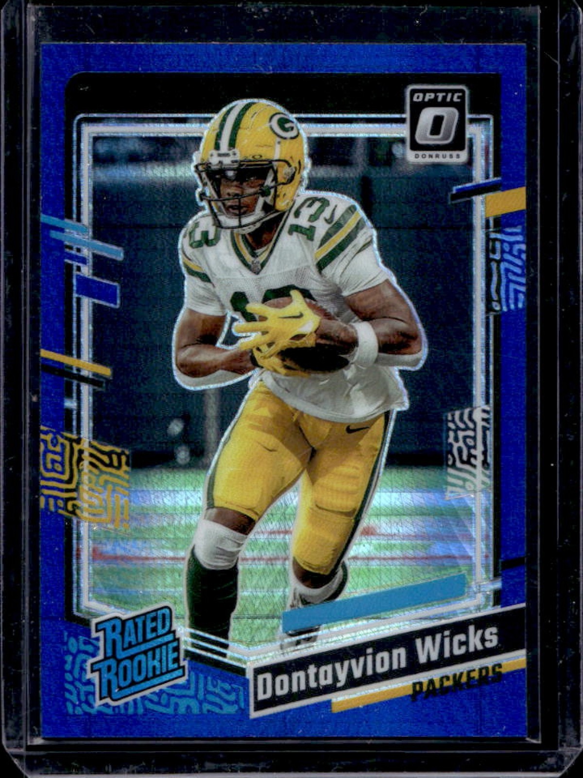 2023 Donruss Optic Dontayvion Wicks Blue Hyper Prizm Rated Rookie #249 Packers