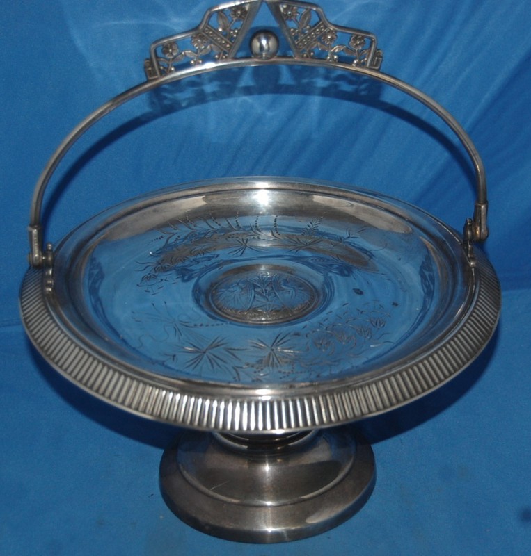 A Quadruple Silver Plate Bride's Basket, from Pairpoint, circa 1884
