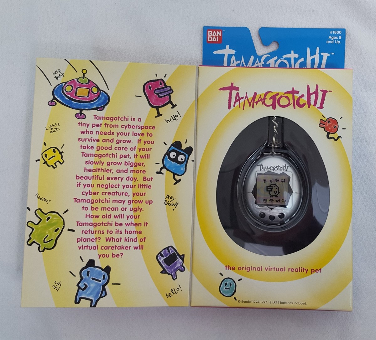 1996/1997 Bandai Original TAMAGOTCHI Virtual Pet v1 SILVER