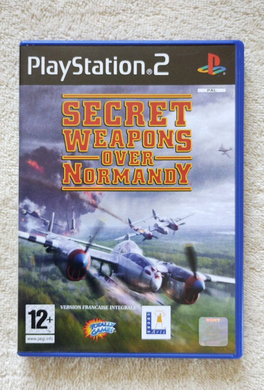 secret weapons over normandy PS2 . PAL FR TBE . complet . disque état neuf