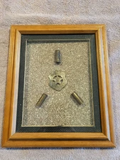 VINTAGE UNION PACIFIC RAILROAD POLICE BADGE DISPLAYED WITH SHELL CASINGS IN CASE