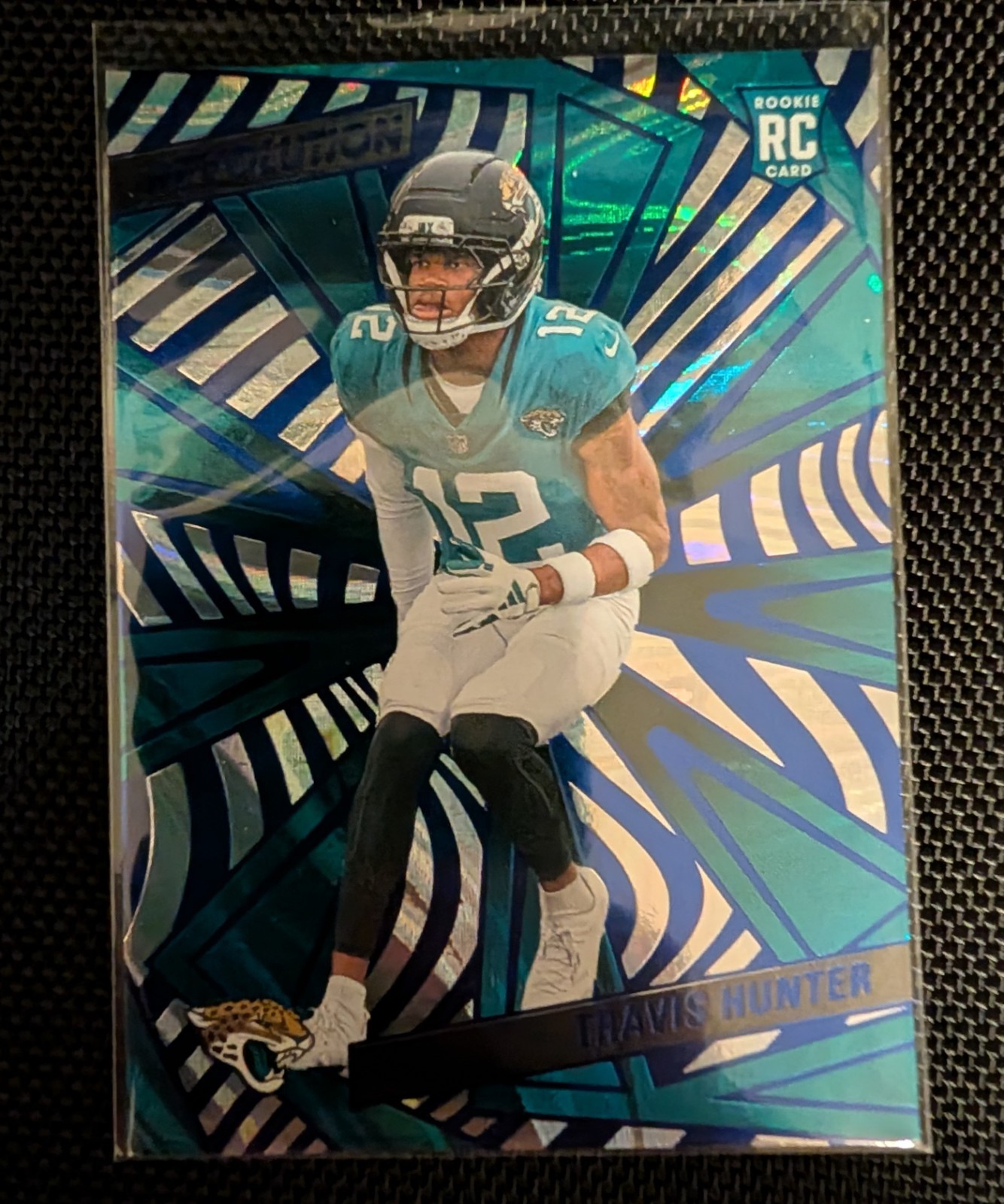 2025 Panini Revolution - Rookies Travis Hunter #242 Blue Cosmo /99 (RC)