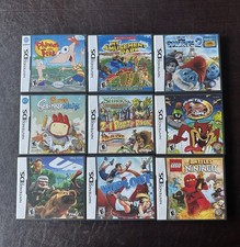 DS Lot With Ninjago, The Smurfs 2, UP, Wipeout 2, Taz Ball Tested And Working