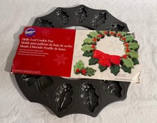 WILTON HOLLY FOGLIA E FIOCCO CORONA 15" BISCOTTIERA 12 CAVITITE 2020 NATALE NUOVO