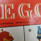 Vintage 1961 Stratego board game box with red/white logo, yellow background, and text “Printed in U.S.A.”