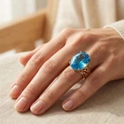 Brilliant Neon Blue Topaz 31.55Ct 925 Sterling Silver 24K Gold Rings Size 6.25