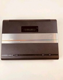 Atari 7800 console with 35 games, 2 controllers, power cord, storage case WORKS