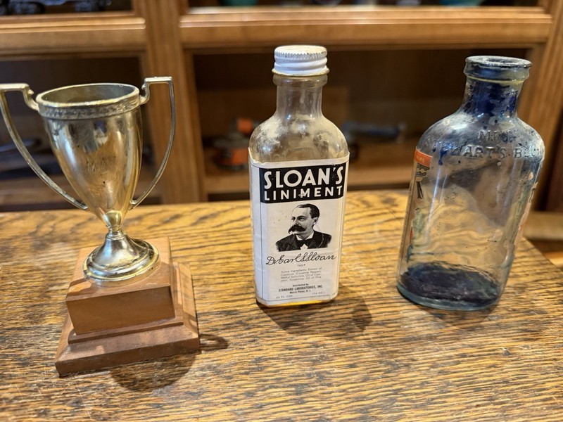 Small Trophy Cup, Sloans Liniment Medicine Bottle, Mrs. Stewart’s Blueing Bottle