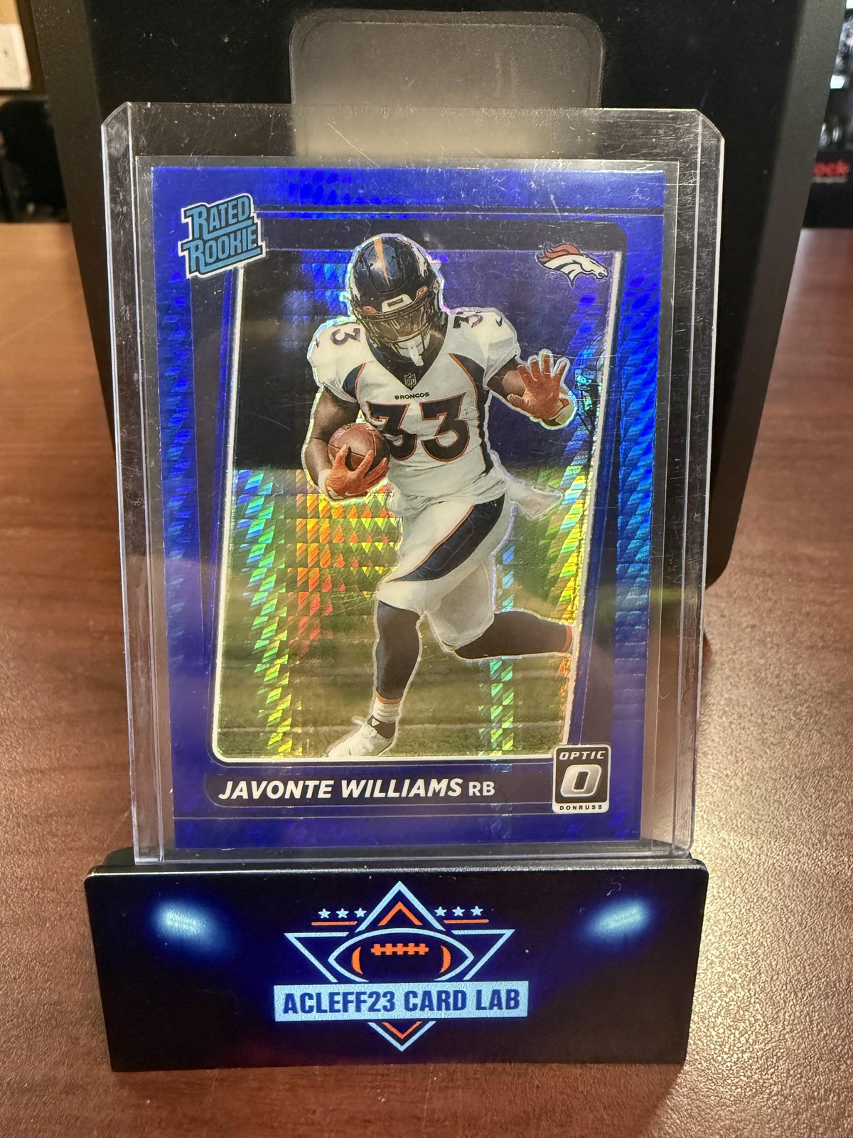 2021 Donruss Optic #215 Javonte Williams Blue Hyper