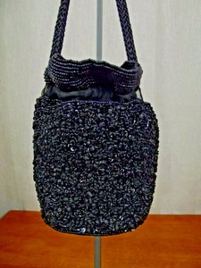 black drawstring evening bag