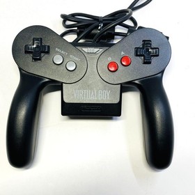 Nintendo Virtual Boy console, 3 games, and AC adapter/tap included.