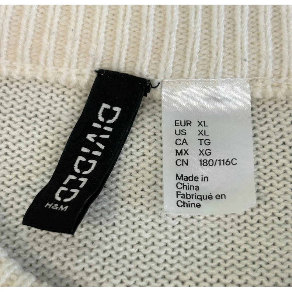 Suéter corto tejido onda geométrica H&M para mujer crema negro manga globo XL Foto 3 de 4