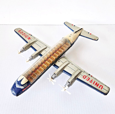 Vintage Nomura TN United DC-7 Mainliner Tin Friction Airplane Visible Cabin RARE