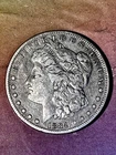 1884 S  Morgan $ RARE VF + ( AG $100 T OZ?))