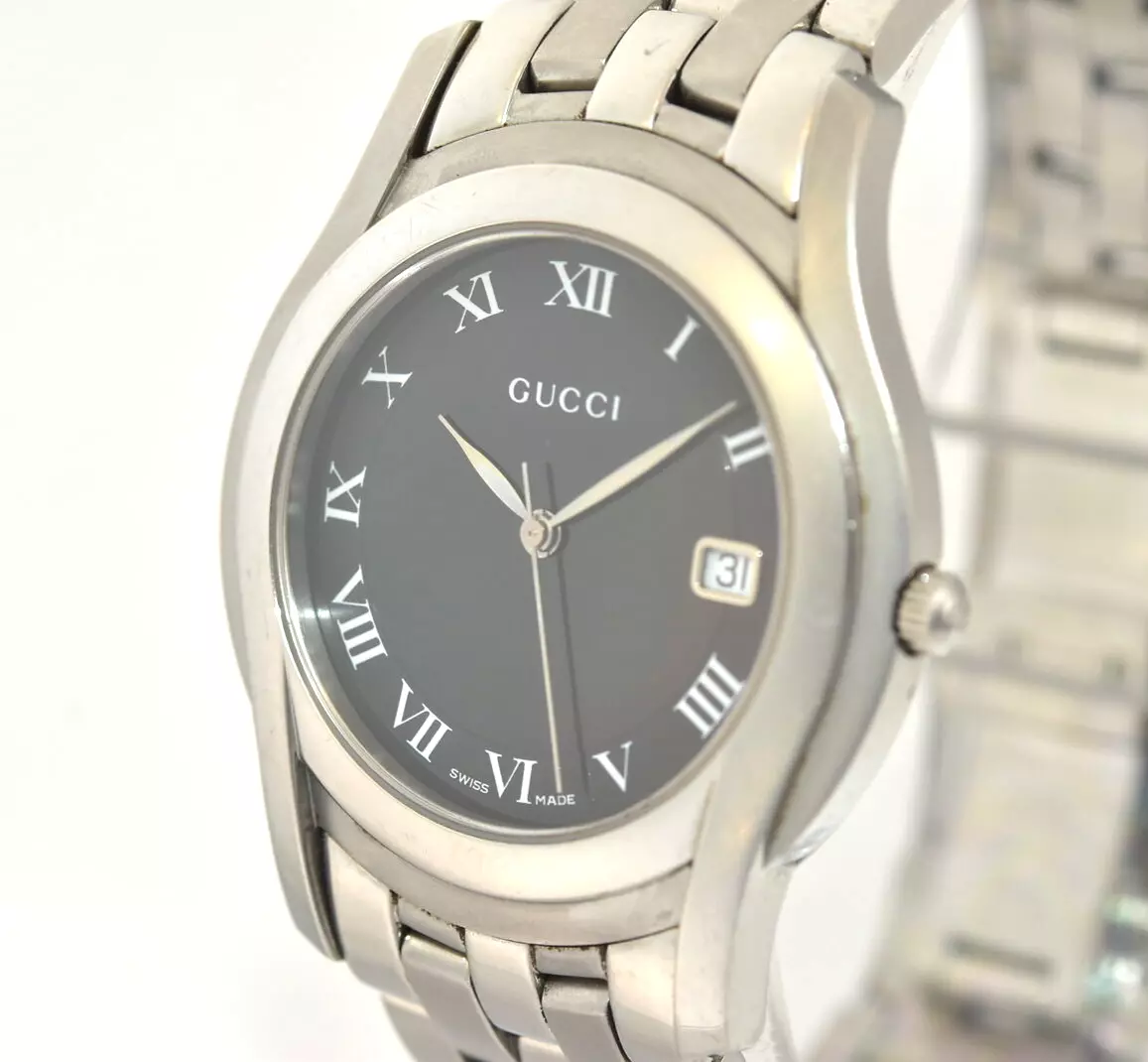 Montre à quartz homme Gucci 5500M cadran noir date neuve à pile fabrication suisse 