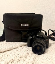 Canon EOS Rebel T7 24.1MP DSLR w/ 18-55mm f/3.5-5.6 IS, Bag, 2 Batt