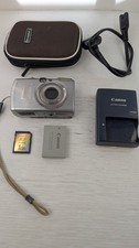 Canon IXUS 800 IS 6 MP functional camera with charger battery and SD card