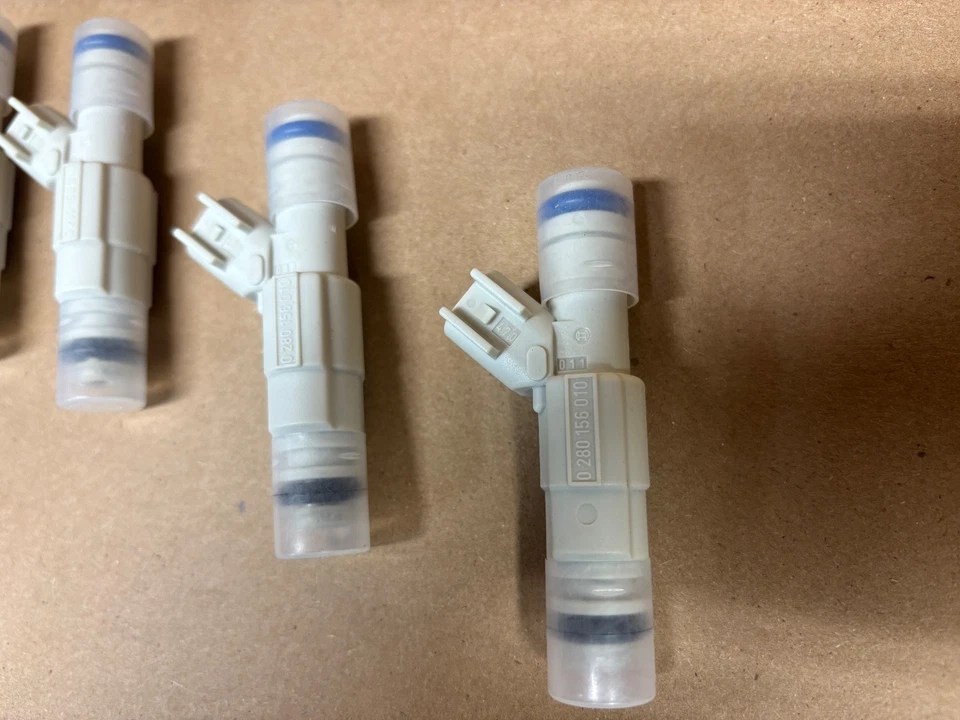 NUEVO JUEGO DE INYECTORES DE COMBUSTIBLE OEM Motorcraft cm-4971 Ford Ranger Mazda B2300 2.3 i4 2001 Foto 3 de 4