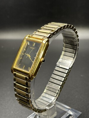 Seiko v701-5848 golden tone rectangle black dial Running stretch