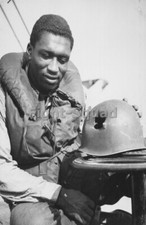 WW2 Picture Photo Sailor of the US examines hole in his helmet 3635