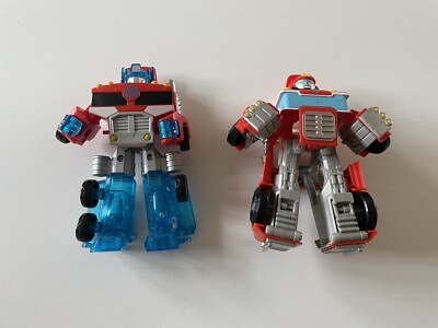 Playskool Transformers Rescue Bots Heatwave and Optimus Prime Action Figures