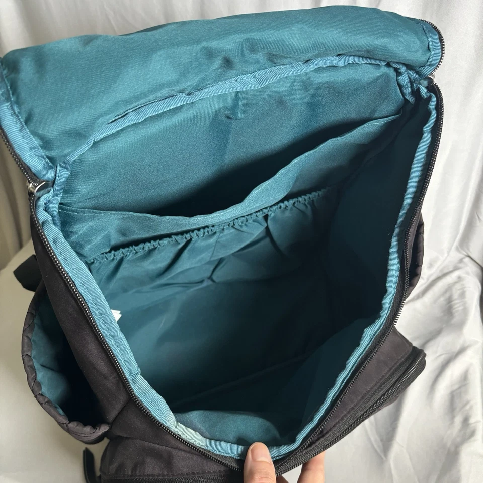 Mochila Bolsa de Pañales Skip Hop Negra Forma Acolchada Bolsillos con Cremallera Correas Ajustables Foto 3 de 4