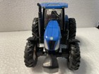 Ertyl Ford set 1/64th scale.3 TRACTORS, GRAVITY WAGON, BALER, 2DISCS, PLOW — photo 2