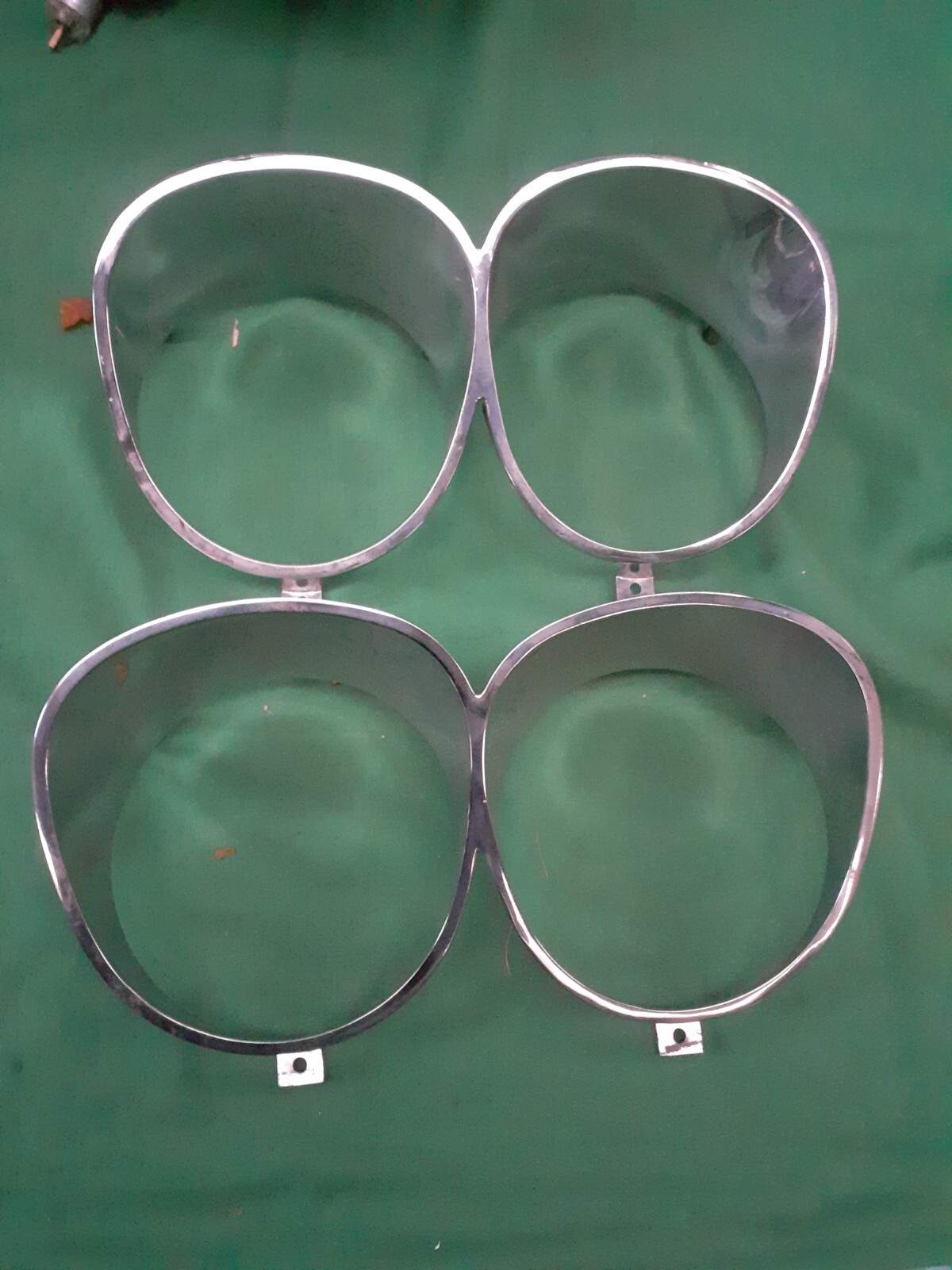 Fiat 130 sedan pair of headlight frames NEW