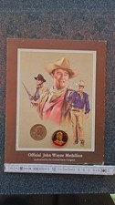 2 John Wayne Gedächtnis Münzen, 1x silberfarben 1x mit bunter Legierung