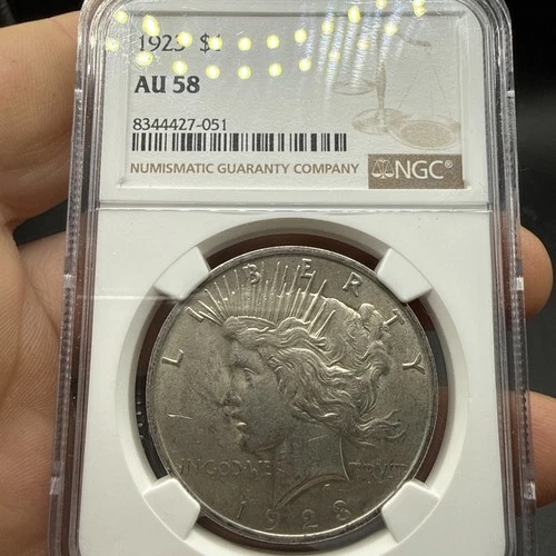 1923 Peace Silver Dollar NGC AU-58