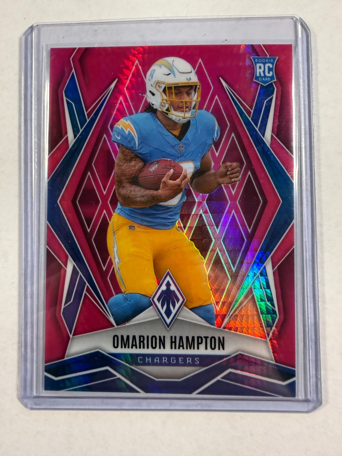 2025 Panini Phoenix - Rookies Omarion Hampton #192 Pink Winter /299 (RC)
