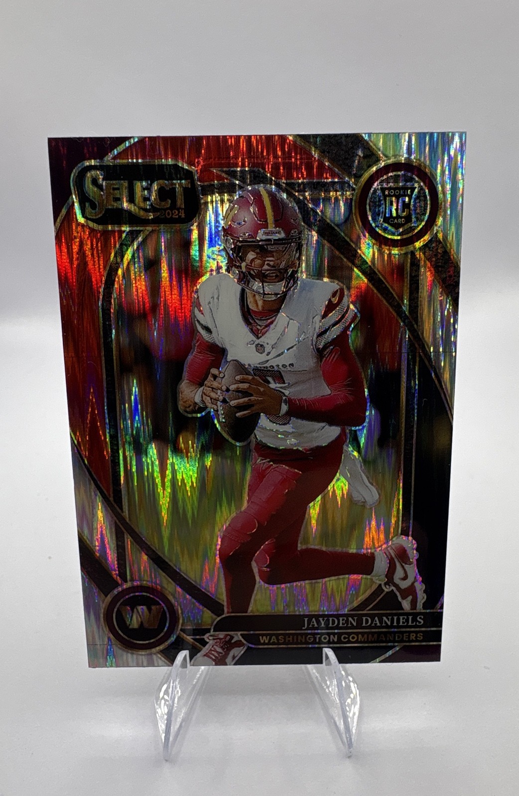 2024 Panini Select - Club Level Jayden Daniels #217 Black & Red Shock Prizm (RC)