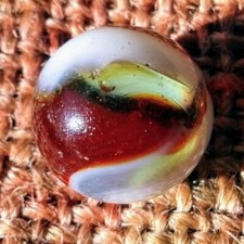 5/8" Peltier Rare HTF Transparent NLR Cross though Marble In Mint Condition...