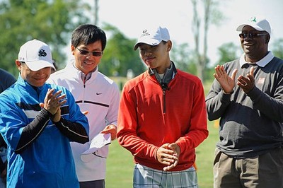 Peter Chen Hanwen Guan Tianlang Guan visit the junior players at L- Old Photo