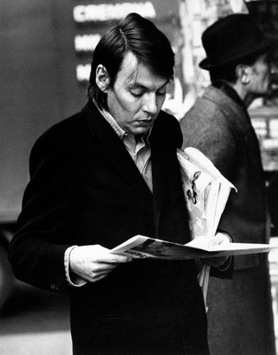 Italian singer songwriter Fabrizio De Andre reading a newspaper Mi- Old Photo