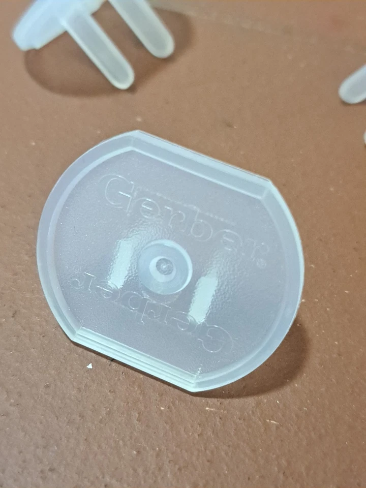 Enchufes de seguridad eléctricos invisibles para bebé Gerber de colección 18 Foto 2 de 3
