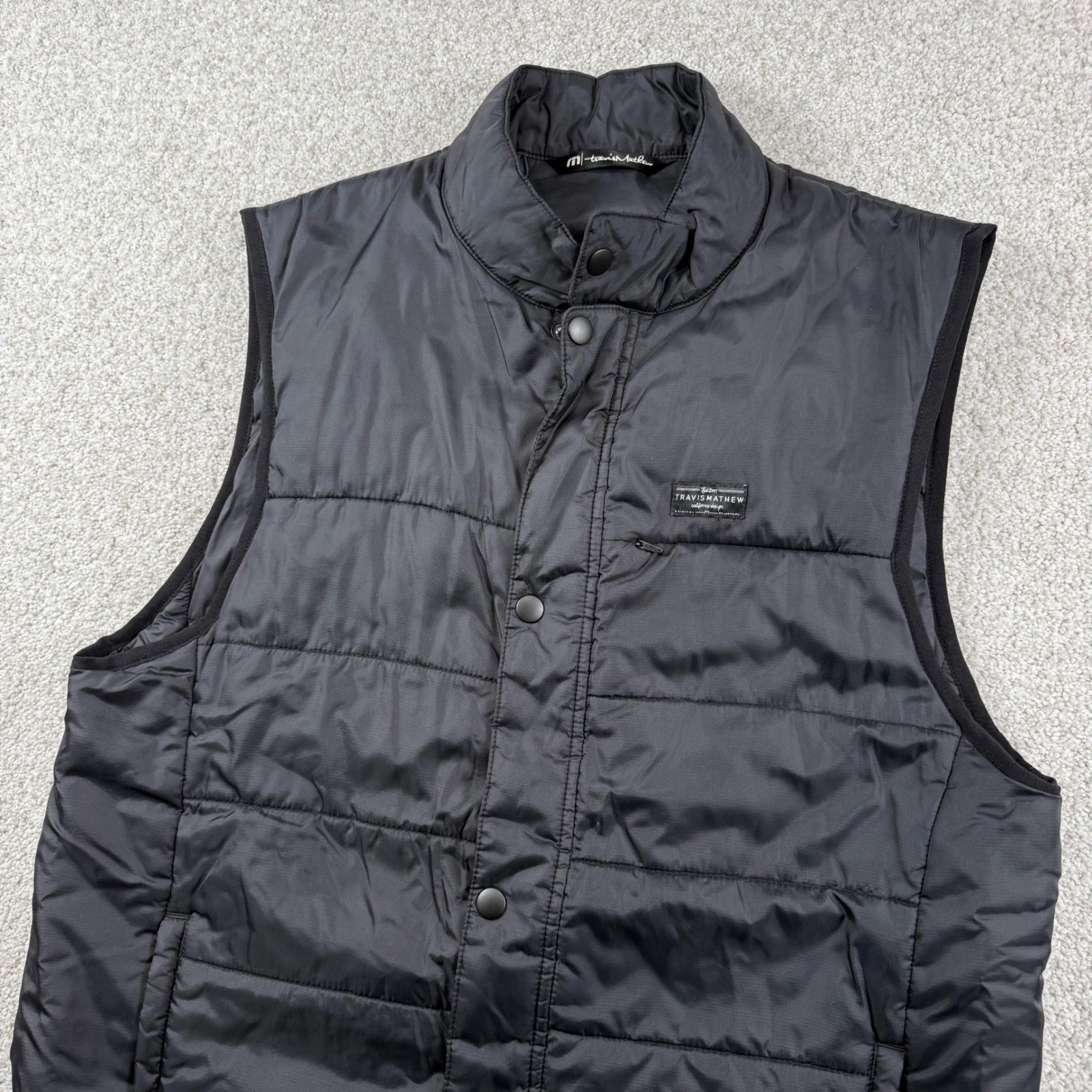 TravisMathew Puffer Vest Men M Black Quilted Ripstop Full Zip Snap Front Golf