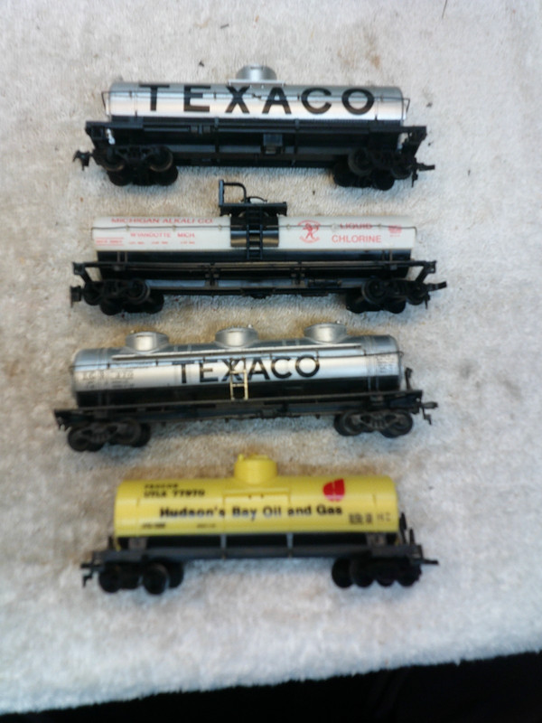 h/o scale 4 assorted tankers lifelike tyco & ???