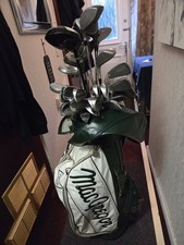 40 Assorted Golf Clubs.