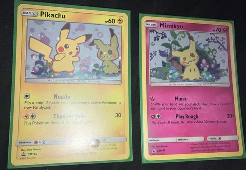 Pikachu and Mimikyu SM162 and Sm163 Near Mint Black Star Promo Pokemon TCG
