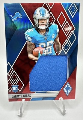 2023 Panini Phoenix Jahmyr Gibbs Rookie Jumbo Memorabilia Red /125 #RJM-JG