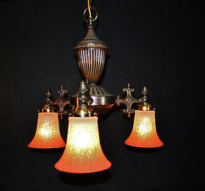 An Edwardian cut and moulded glass and silver plated metal chandelier An Edwardian cut and moulded glass and silver plated metal chandelier