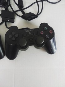 Sony PlayStation 2 Slim 2 Controllers, Cords & 10 Games. 