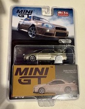 1/64 Mini GT Nissan Skyline GT-R R34 M Spec Silica Breath Bronz MGT00348