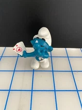 smurfs card player poker player