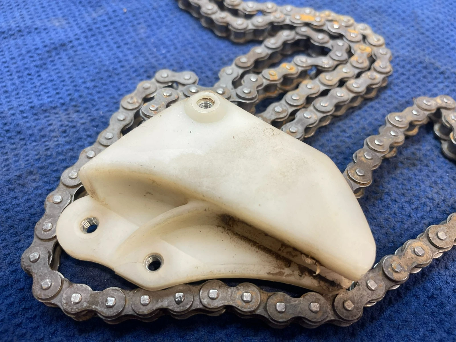 2006 OEM HONDA CR85 Honda OEM CHAIN GUIDE AND CHAIN ASSEMBLY 2006 CHAIN