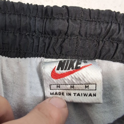 Pantaloni a vento Nike vintage anni 90 foderati pantaloni pista zip alla caviglia neri UOMO M 30x30 - Foto 3 di 11